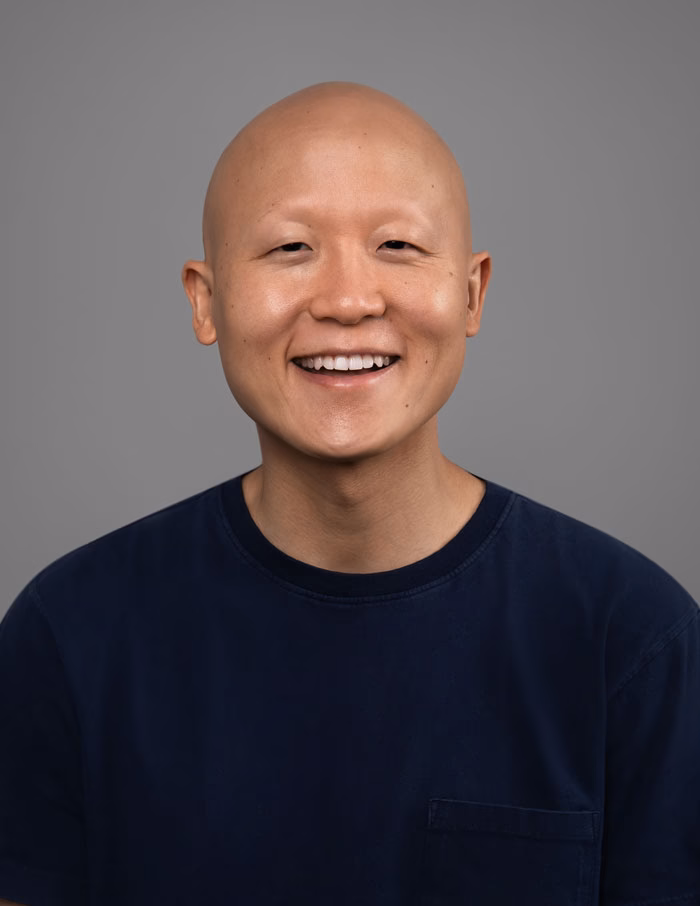 Actor’s studio headshot with soft grey background