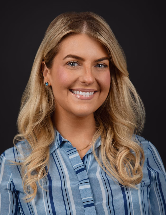 Headshot with black background in NYC studio