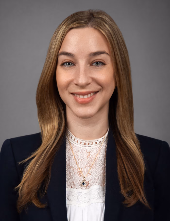 Studio headshot of NYC marketing executive