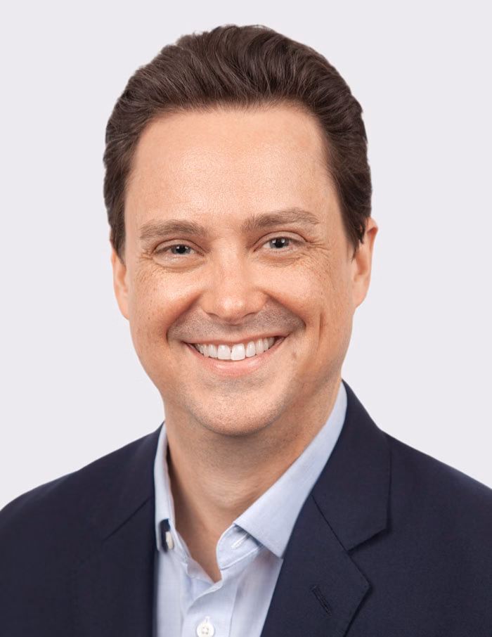 LinkedIn-ready corporate headshot taken at a Tribeca photography studio.