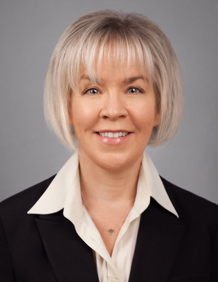 Businesswoman headshot in bright NYC studio