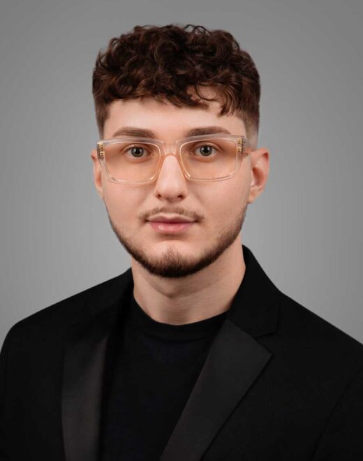 Professional LinkedIn headshot taken at an NYC photography studio.