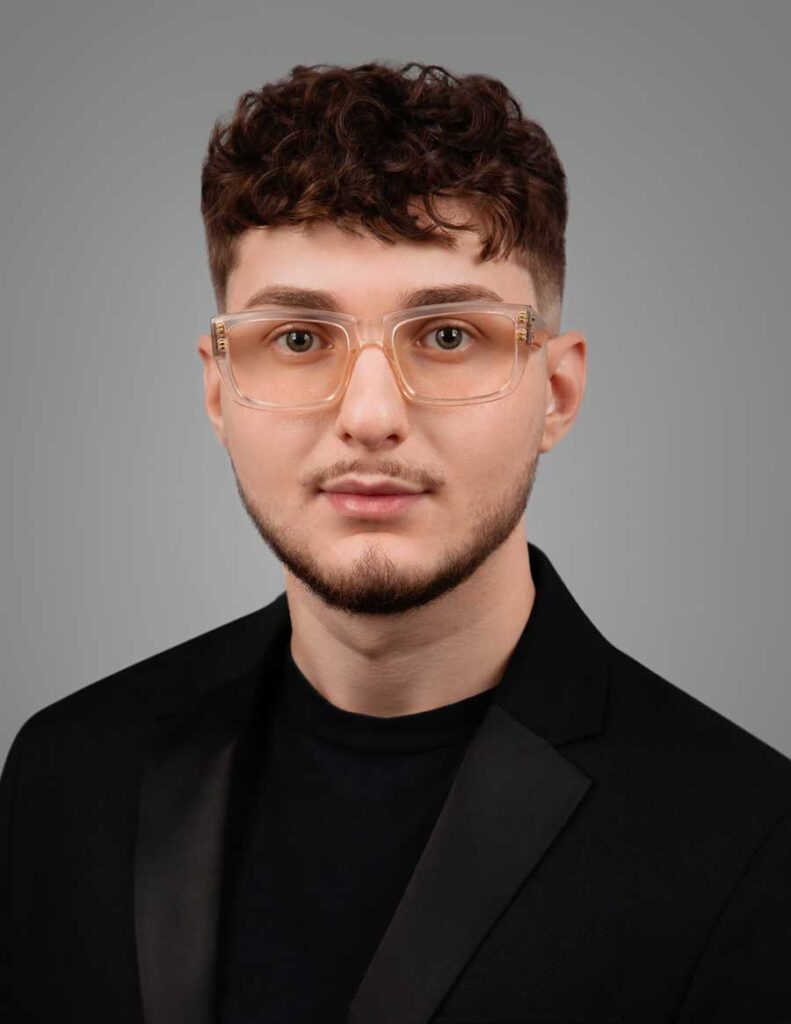 Professional LinkedIn headshot taken at an NYC photography studio.